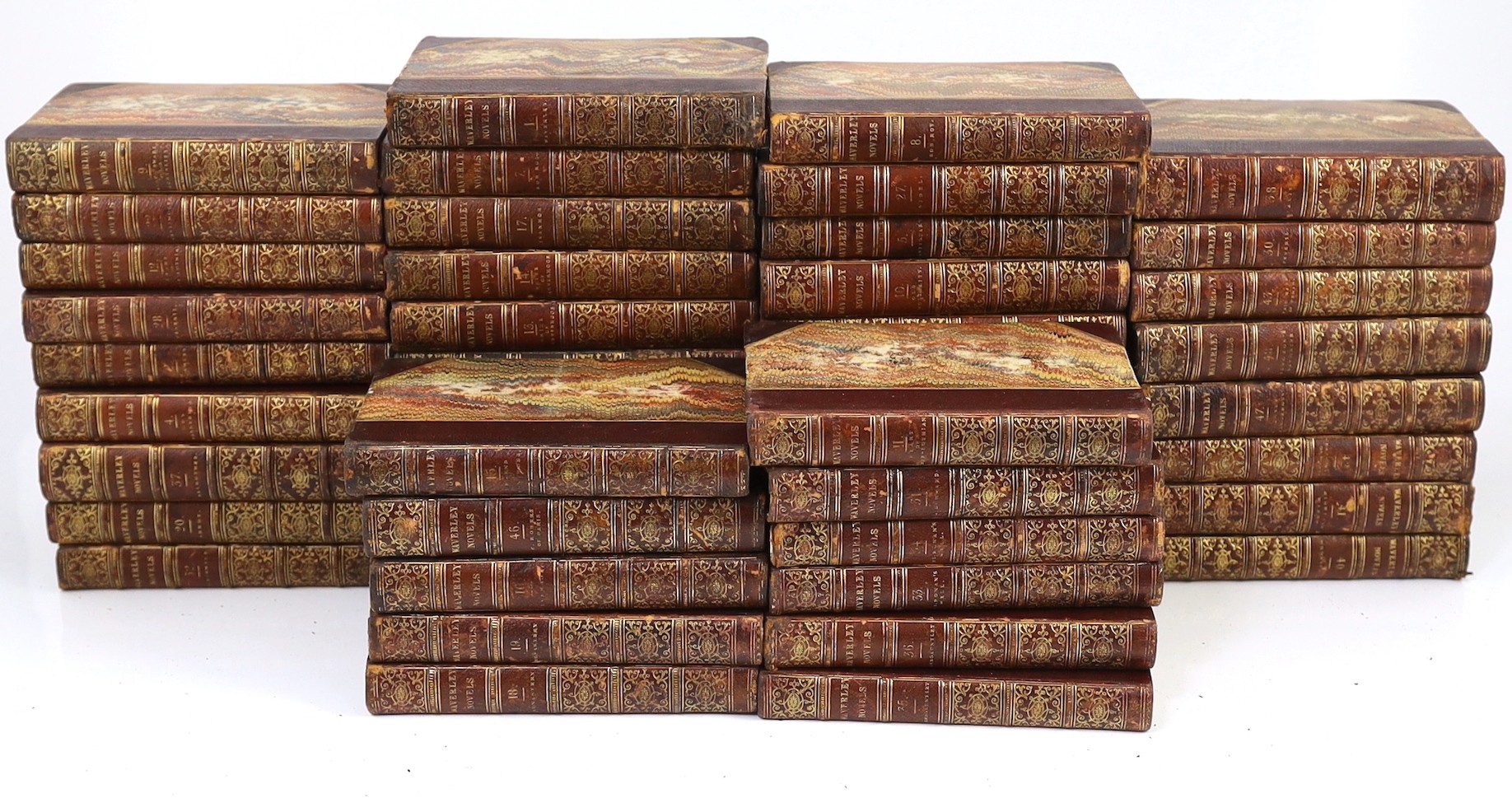 Scott, Sir Walker - Waverley Novels, 48 vols., engraved pictorial and printed titles, frontispieces; contemp. gilt-decorated maroon half morocco and marbled boards with panelled spines, marbled edges and e/ps., sm.8vo. E